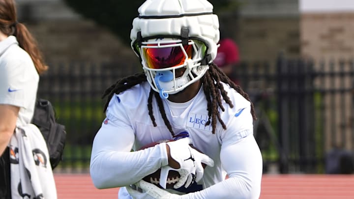 Buffalo Bills running back James Cook runs with the ball during training camp at St. John Fisher College.