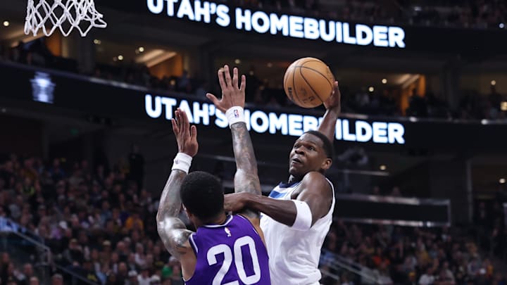 Mar 18, 2024; Salt Lake City, Utah, USA; Minnesota Timberwolves guard Anthony Edwards (5) dunks the