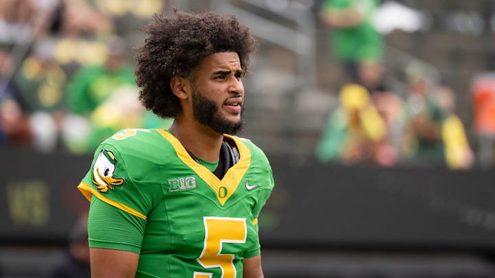 Oregon quarterback Dante Moore warms up as the Oregon Ducks host the Oklahoma State Cowboys on Sept. 6, 2025, at Autzen Stadium in Eugene, Oregon.