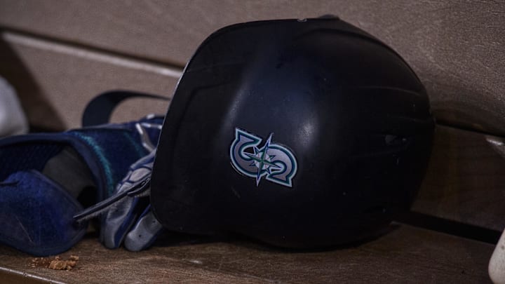 Jun 5, 2022; Arlington, Texas, USA; A view of a Seattle Mariners batting helmet and logo during the game between the Texas Rangers and the Seattle Mariners at Globe Life Field. Mandatory Credit: Jerome Miron-Imagn Images Jun 5, 2022; Arlington, Texas, USA; A view of a Seattle Mariners batting helmet and logo during the game between the Texas Rangers and the Seattle Mariners at Globe Life Field. Mandatory Credit: Jerome Miron-Imagn Images