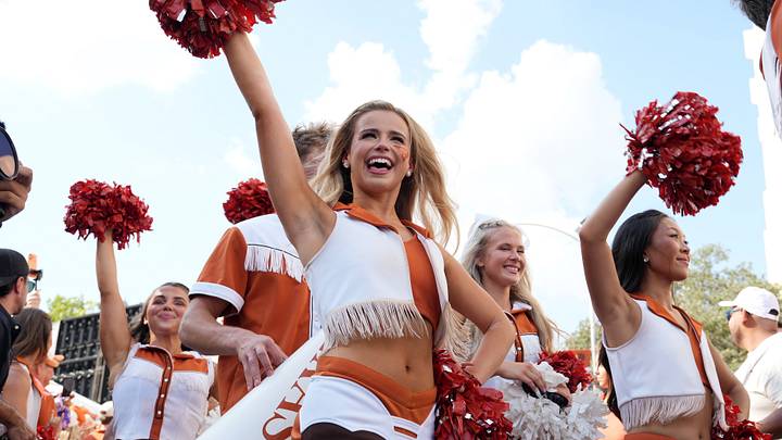 Texas Longhorns cheerleaders arrive before the game against the Ohio State Buckeyes at Darrell K Royal-Texas Memorial Stadium