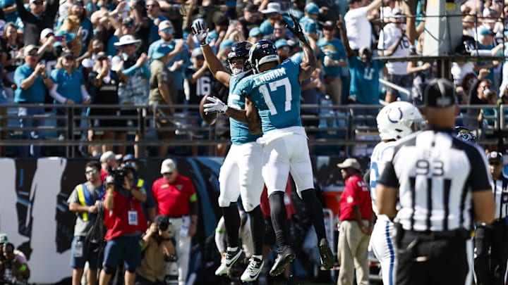 Oct 15, 2023; Jacksonville, Florida, USA; Jacksonville Jaguars tight end Brenton Strange (85) and tight end Evan Engram (17) celebrate a touchdown against the Indianapolis Colts during the third quarter at EverBank Stadium. Mandatory Credit: Morgan Tencza-Imagn Images Oct 15, 2023; Jacksonville, Florida, USA; Jacksonville Jaguars tight end Brenton Strange (85) and tight end Evan Engram (17) celebrate a touchdown against the Indianapolis Colts during the third quarter at EverBank Stadium. Mandatory Credit: Morgan Tencza-Imagn Images