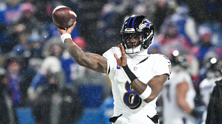 Baltimore Ravens quarterback Lamar Jackson throws the ball during warm ups before the game against the Buffalo Bills.