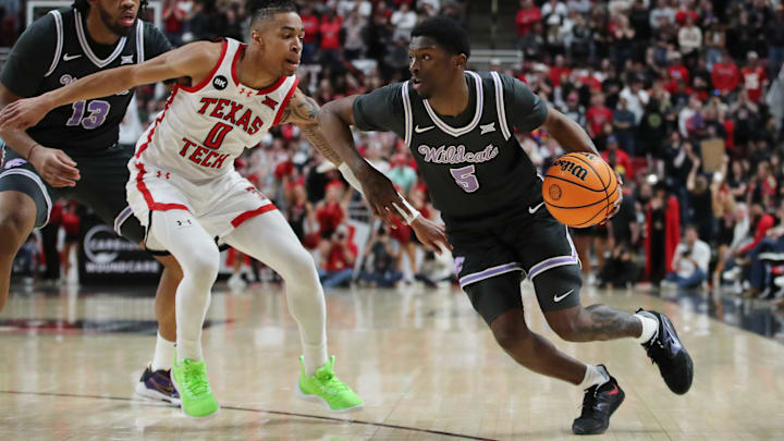 Jan 13, 2024; Lubbock, Texas, USA;  Kansas State Wildcats guard Cam Carter (5) drives to the lane.