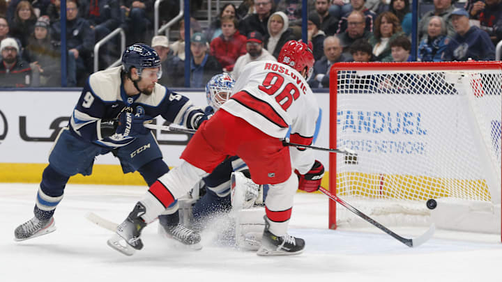 Dec 31, 2024; Columbus, Ohio, USA; Carolina Hurricanes center Jack Roslovic (96) scores a goal against the Columbus Blue Jackets during the second period at Nationwide Arena. Mandatory Credit: Russell LaBounty-Imagn Images
