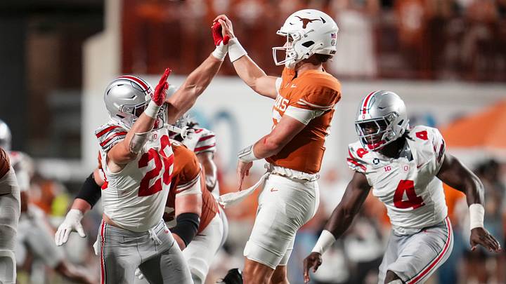 Ohio State Buckeyes linebacker Payton Pierce (26) disrupts a pass attempt by Texas Longhorns quarterback Arch Manning (16) during the NCAA football game at Darrell K Royal–Texas Memorial Stadium in Austin, Texas on Sept. 12, 2026. Texas won 24-23. Ohio State Buckeyes linebacker Payton Pierce (26) disrupts a pass attempt by Texas Longhorns quarterback Arch Manning (16) during the NCAA football game at Darrell K Royal–Texas Memorial Stadium in Austin, Texas on Sept. 12, 2026. Texas won 24-23.