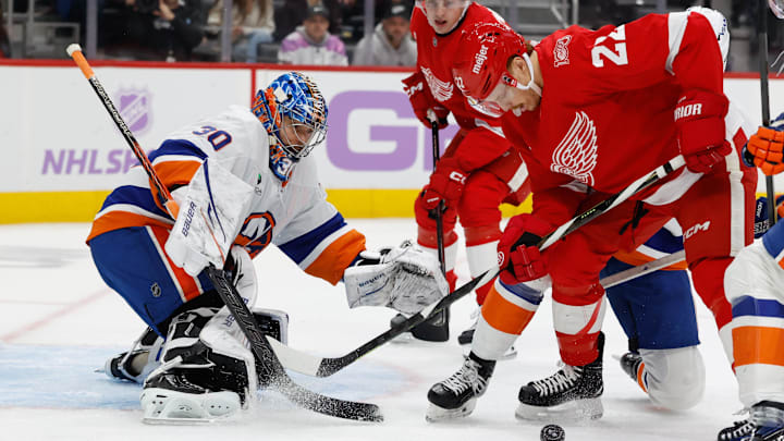 Nov 20, 2025; Detroit, Michigan, USA;  Detroit Red Wings center Mason Appleton (22) tries to score on New York Islanders goaltender Ilya Sorokin (30) in the second period at Little Caesars Arena. Mandatory Credit: Rick Osentoski-Imagn Images