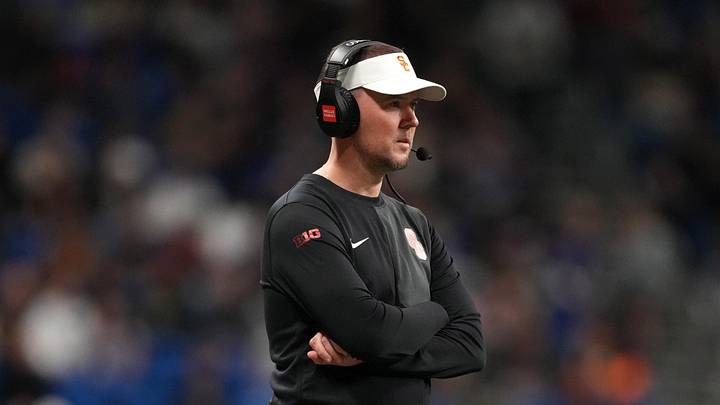 Dec 30, 2025; San Antonio, TX, USA; Southern California Trojans head coach Lincoln Riley watches from the sidelines against the TCU Horned Frogs in the first half during the Alamo Bowl at Alamodome. Mandatory Credit: Kirby Lee-Imagn Images Dec 30, 2025; San Antonio, TX, USA; Southern California Trojans head coach Lincoln Riley watches from the sidelines against the TCU Horned Frogs in the first half during the Alamo Bowl at Alamodome. Mandatory Credit: Kirby Lee-Imagn Images
