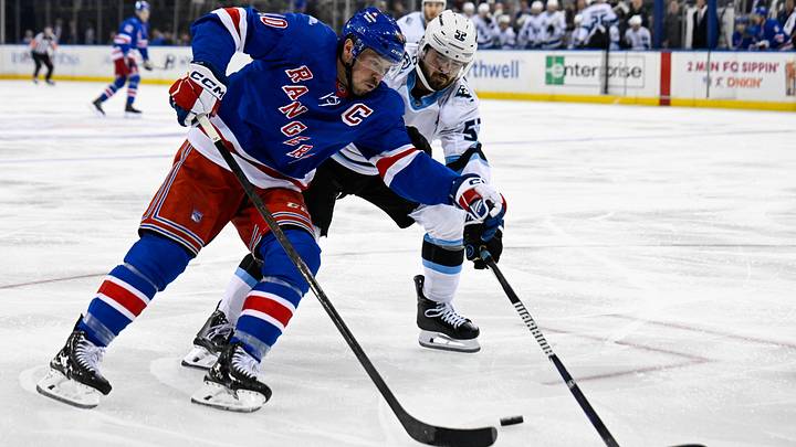 Oct 4, 2026; New York, New York, USA; Utah Mammoth defenseman MacKenzie Weegar (52) defends against New York Rangers center J.T. Miller (10) during the second period at Madison Square Garden. Mandatory Credit: Dennis Schneidler-Imagn Images Oct 4, 2026; New York, New York, USA; Utah Mammoth defenseman MacKenzie Weegar (52) defends against New York Rangers center J.T. Miller (10) during the second period at Madison Square Garden. Mandatory Credit: Dennis Schneidler-Imagn Images