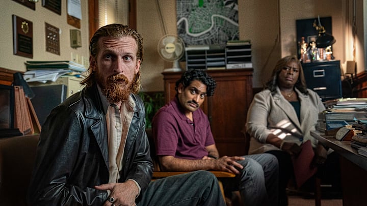 Hit Man. (L-R) Austin Amelio as Jasper, Sanjay Rao as Phil and Retta as Claudette in Hit Man. Cr. Brian Roedel/Netflix © 2024