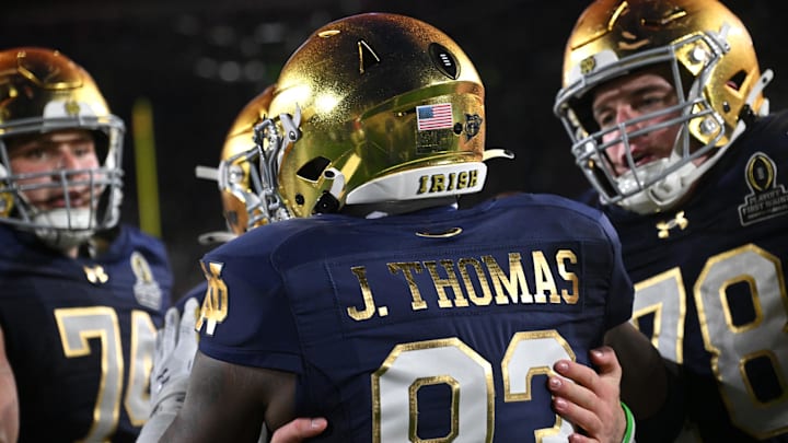 Notre Dame Fighting Irish wide receiver Jayden Thomas (83) celebrates with teammates after scoring a touchdown during the first quarter against the Indiana Hoosiers at Notre Dame Stadium. 