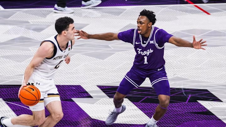 Jayden Pierre guards Logan Imes in Notre Dame's 87 to 85 overtime win at TCU on Friday, December 5, 2025. Jayden Pierre guards Logan Imes in Notre Dame's 87 to 85 overtime win at TCU on Friday, December 5, 2025.