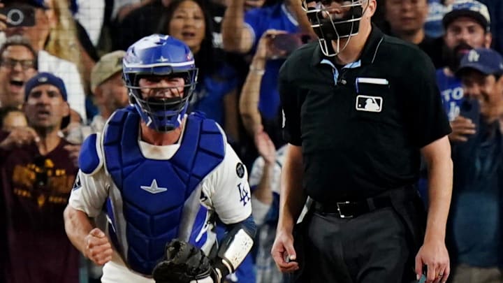 Dodgers catcher Ben Rortvedt celebrates in the sixth inning against the Cincinnati Reds in Game 2 of a National League wild card series game in Los Angeles on Oct. 1. Dodgers catcher Ben Rortvedt celebrates in the sixth inning against the Cincinnati Reds in Game 2 of a National League wild card series game in Los Angeles on Oct. 1.