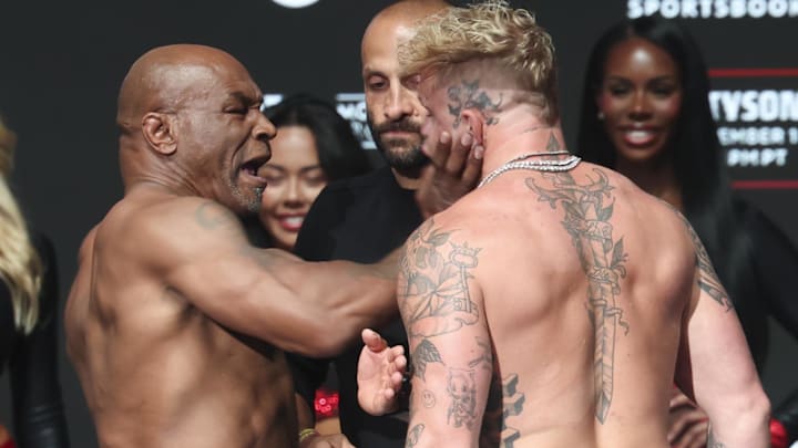 Mike Tyson slaps Jake Paul after weighing in at the Toyota Music Factory. Mike Tyson slaps Jake Paul after weighing in at the Toyota Music Factory.