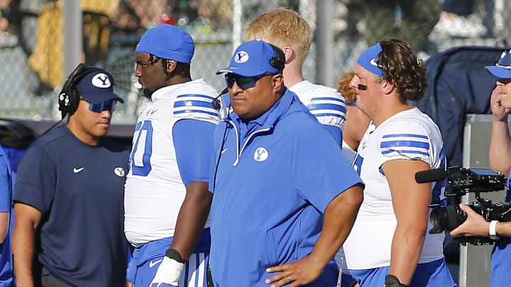 Oct 26, 2024; Orlando, Florida, USA;  Brigham Young Cougars head coach Kalani Sitake looks on in the first half against the Central Florida Knights at FBC Mortgage Stadium. Mandatory Credit: Russell Lansford-Imagn Images