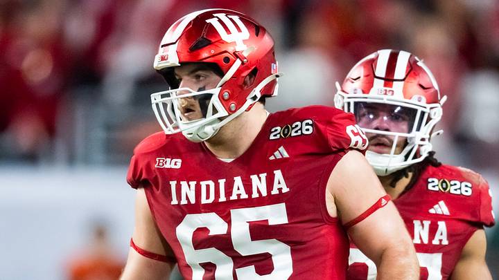Jan 19, 2026; Miami Gardens, FL, USA; Indiana Hoosiers offensive lineman Carter Smith (65) against the Miami Hurricanes in the College Football Playoff National Championship game at Hard Rock Stadium. Mandatory Credit: Mark J. Rebilas-Imagn Images