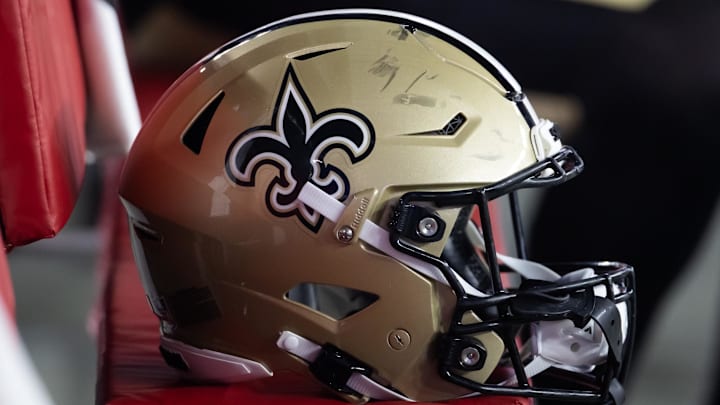 Aug 10, 2024; Glendale, Arizona, USA; Detailed view of a New Orleans Saints helmet during a preseason NFL game at State Farm Stadium. Mandatory Credit: Mark J. Rebilas-Imagn Images
