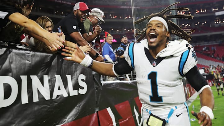 Carolina Panthers quarterback Cam Newton (1) celebrates after beating the Arizona Cardinals 34-10 at State Farm Stadium in Glendale, Arizona, on Nov. 14, 2021.
