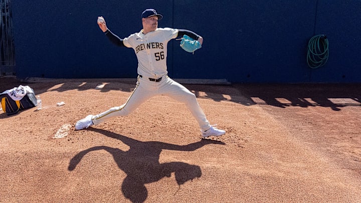 Mar 2, 2024; Phoenix, Arizona, USA; Milwaukee Brewers pitcher Janson Junk (56) readies himself during a spring training game against the Los Angeles Dodgers at American Family Fields of Phoenix. Mandatory Credit: Allan Henry-Imagn Images Mar 2, 2024; Phoenix, Arizona, USA; Milwaukee Brewers pitcher Janson Junk (56) readies himself during a spring training game against the Los Angeles Dodgers at American Family Fields of Phoenix. Mandatory Credit: Allan Henry-Imagn Images