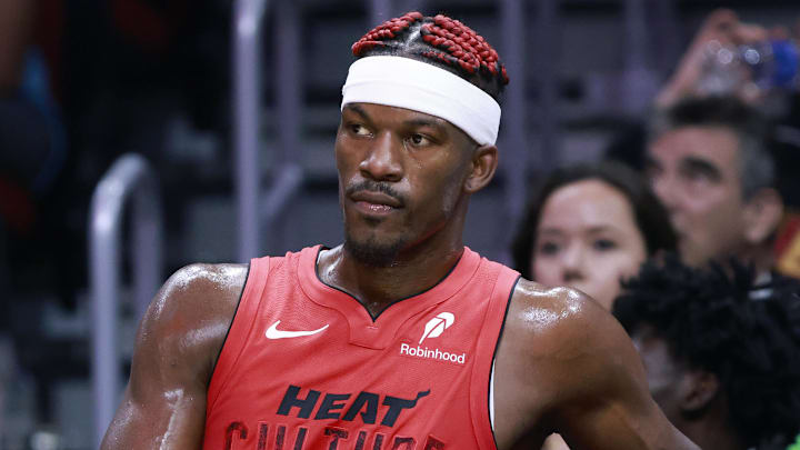 Nov 24, 2024; Miami, Florida, USA;  Miami Heat forward Jimmy Butler (22) sits on the bench against the Dallas Mavericks during the second half at Kaseya Center. Mandatory Credit: Rhona Wise-Imagn Images