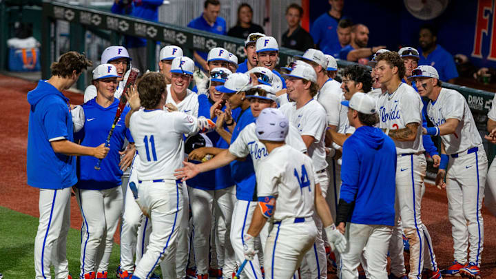 Florida infielder Brendan Lawson (11) hits his ninth homer of the season in the bottom of the sixth against FSU, March 10, 2026, at Condron Family Ballpark in Gainesville, Florida.The Gators beat the Seminoles 6-3. [Cyndi Chambers/ Gainesville Sun] 2026