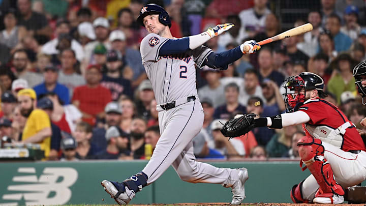 Houston Astros third baseman Alex Bregman hits a single during a game against the Boston Red Sox on Aug. 9 at Fenway Park.