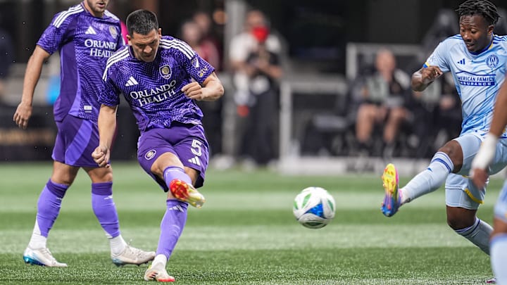 May 28, 2025; Atlanta, Georgia, USA; Orlando City midfielder Cesar Araujo (5) scores a goal against Atlanta United during the first half at Mercedes-Benz Stadium. Mandatory Credit: Dale Zanine-Imagn Images