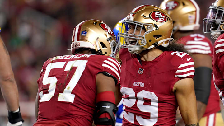 Dec 12, 2024; Santa Clara, California, USA; San Francisco 49ers linebacker Dre Greenlaw (57) is congratulated by safety Talanoa Hufanga (29) after making a tackle against the Los Angeles Rams in the first quarter at Levi's Stadium. Mandatory Credit: Cary Edmondson-Imagn Images Dec 12, 2024; Santa Clara, California, USA; San Francisco 49ers linebacker Dre Greenlaw (57) is congratulated by safety Talanoa Hufanga (29) after making a tackle against the Los Angeles Rams in the first quarter at Levi's Stadium. Mandatory Credit: Cary Edmondson-Imagn Images