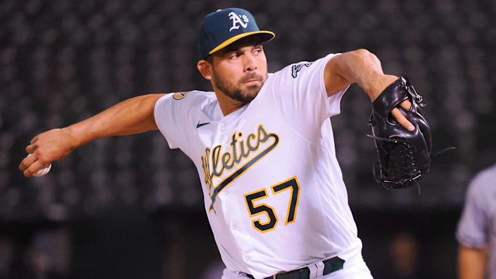 Sep 8, 2022; Oakland, California, USA; Oakland Athletics relief pitcher Tyler Cyr (57) throws a pitch against the Chicago White Sox during the sixth inning at RingCentral Coliseum. Mandatory Credit: Kelley L Cox-Imagn Images