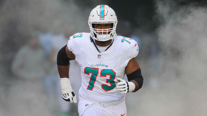 Miami Dolphins tackle Austin Jackson enters the field to take on the New York Jets at Hard Rock Stadium in 2023.