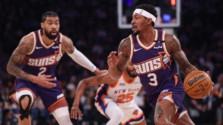 Apr 6, 2025; New York, New York, USA; Phoenix Suns guard Bradley Beal (3) dribbles as New York Knicks forward Mikal Bridges (25) is screened by Phoenix Suns center Nick Richards (2) during the first half at Madison Square Garden. Mandatory Credit: Vincent Carchietta-Imagn Images