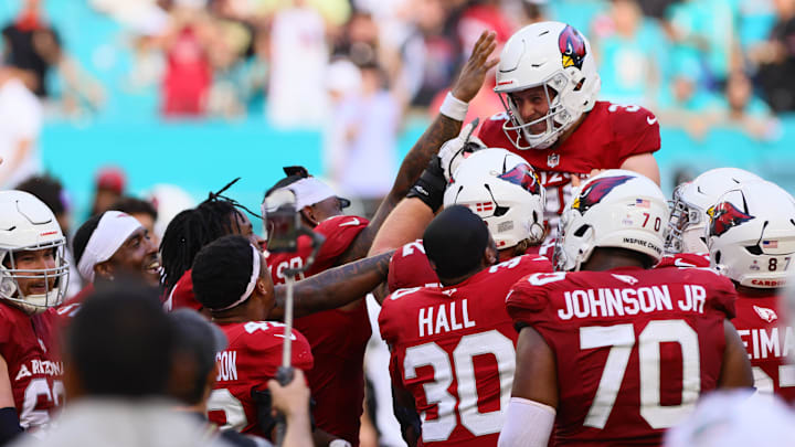 Oct 27, 2024; Miami Gardens, Florida, USA; Arizona Cardinals kicker Chad Ryland (38) celebrates with teammates after scoring the game-winning field goal against the Miami Dolphins during the fourth quarter at Hard Rock Stadium. Mandatory Credit: Sam Navarro-Imagn Images Oct 27, 2024; Miami Gardens, Florida, USA; Arizona Cardinals kicker Chad Ryland (38) celebrates with teammates after scoring the game-winning field goal against the Miami Dolphins during the fourth quarter at Hard Rock Stadium. Mandatory Credit: Sam Navarro-Imagn Images