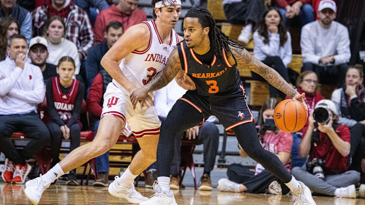 Sam Houston State Bearkats guard Lamar Wilkerson (3) dribbles the ball while Indiana Hoosiers guard Trey Galloway (32) defends in the first half at Simon Skjodt Assembly Hall.