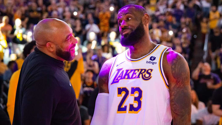 Feb 25, 2024; Phoenix, Arizona, USA; Los Angeles Lakers head coach Darvin Ham with forward LeBron
