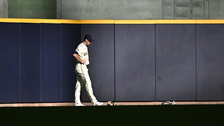 May 10, 2024; Milwaukee, Wisconsin, USA; Milwaukee Brewers pitcher Robert Gasser (54) stretches out in the outfield before taking the mound for his first Major League Baseball start against the St. Louis Cardinals at American Family Field. Mandatory Credit: Michael McLoone-Imagn Images