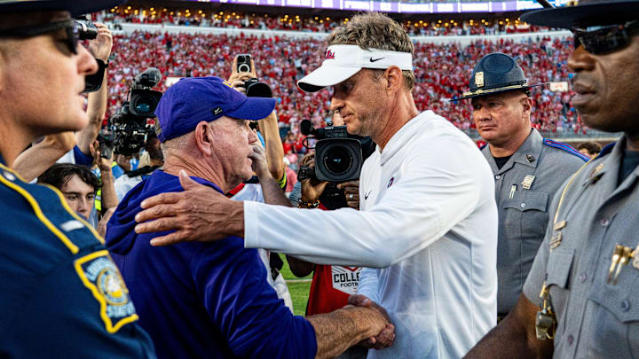 LSU head coach Brian Kelly and Ole Miss head coach Lane Kiffin shake hands after a college football game between Ole Miss and LSU at Vaught-Hemingway Stadium in Oxford, Miss., on Saturday, Sept. 27, 2025. Ole Miss defeated LSU 24-19.
