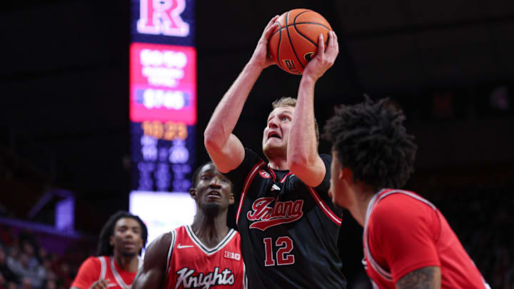 Jan 23, 2026; Piscataway, New Jersey, USA; Indiana Hoosiers forward Tucker Devries (12) goes to the basket against the Rutgers Scarlet Knights during the first half at Jersey Mike's Arena.