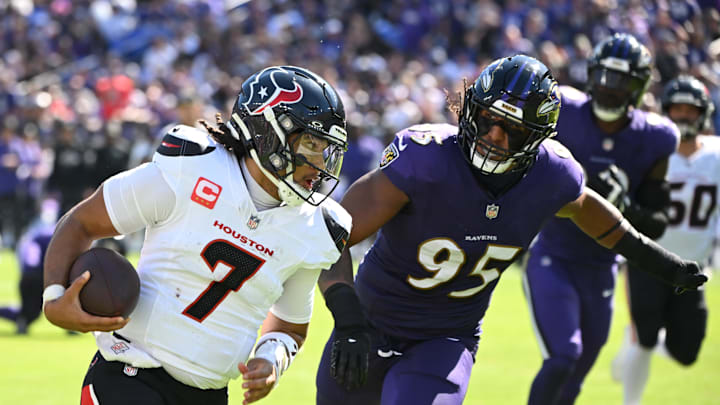 Oct 5, 2025; Baltimore, Maryland, USA; Houston Texans quarterback C.J. Stroud (7) runs for a gain past Baltimore Ravens linebacker Tavius Robinson (95) during the second quarter at M&T Bank Stadium. Mandatory Credit: Rafael Suanes-Imagn Images Oct 5, 2025; Baltimore, Maryland, USA; Houston Texans quarterback C.J. Stroud (7) runs for a gain past Baltimore Ravens linebacker Tavius Robinson (95) during the second quarter at M&T Bank Stadium. Mandatory Credit: Rafael Suanes-Imagn Images