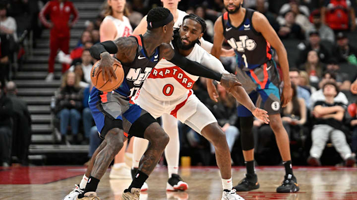 Mar 25, 2024; Toronto, Ontario, CAN;  Brooklyn Nets guard Dennis Schroder (17) dribbles against Javon Freeman-Liberty