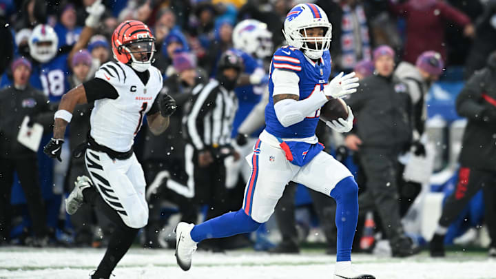 Dec 7, 2025; Orchard Park, New York, USA;  Buffalo Bills cornerback Christian Benford (47) runs the ball for a touchdown after an interception against the Cincinnati Bengals in the fourth quarter at Highmark Stadium.
