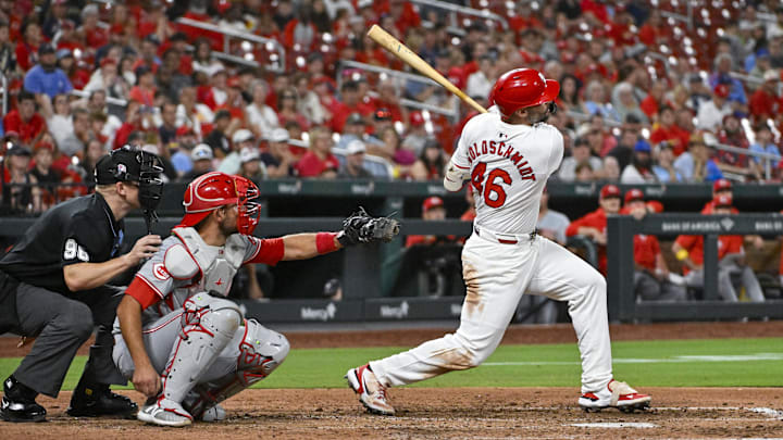 Sep 11, 2024; St. Louis, Missouri, USA;  St. Louis Cardinals first baseman Paul Goldschmidt (46) hits a go ahead one run double against the Cincinnati Reds during the eighth inning at Busch Stadium. Mandatory Credit: Jeff Curry-Imagn Images