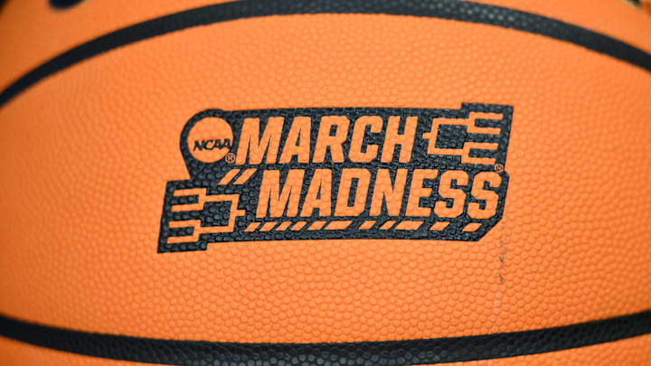 The March Madness logo on a ball 
