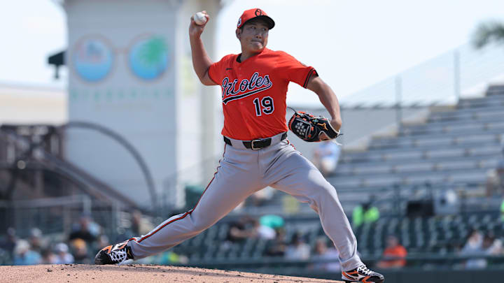 Feb 26, 2025; Bradenton, Florida, USA;  Baltimore Orioles pitcher Tomoyuki Sugano (19) throws a pitch against the Pittsburgh Pirates during the first inning at LECOM Park.