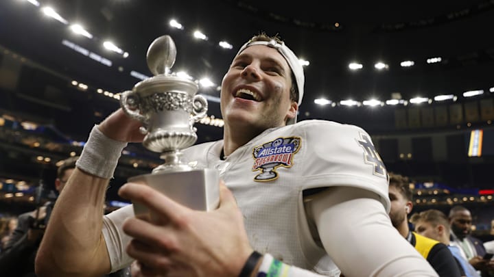 Jan 2, 2025; New Orleans, LA, USA; Notre Dame Fighting Irish quarterback Riley Leonard (13) celebrates with fans in the stands after defeating the Georgia Bulldogs at Caesars Superdome. Jan 2, 2025; New Orleans, LA, USA; Notre Dame Fighting Irish quarterback Riley Leonard (13) celebrates with fans in the stands after defeating the Georgia Bulldogs at Caesars Superdome.