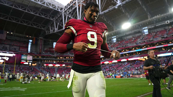 Arizona Cardinals linebacker Isaiah Simmons walks off the field after their 25-24 loss against the