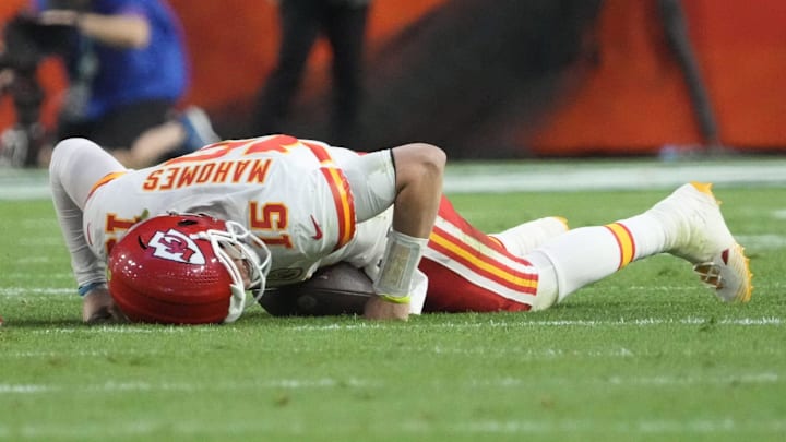 Kansas City Chiefs quarterback Patrick Mahomes (15) is slow to get up after being tackled by Philadelphia Eagles linebacker T.J. Edwards (not pictured) during the second quarter in Super Bowl LVII at State Farm Stadium in Glendale on Feb. 12, 2023. Kansas City Chiefs quarterback Patrick Mahomes (15) is slow to get up after being tackled by Philadelphia Eagles linebacker T.J. Edwards (not pictured) during the second quarter in Super Bowl LVII at State Farm Stadium in Glendale on Feb. 12, 2023.
