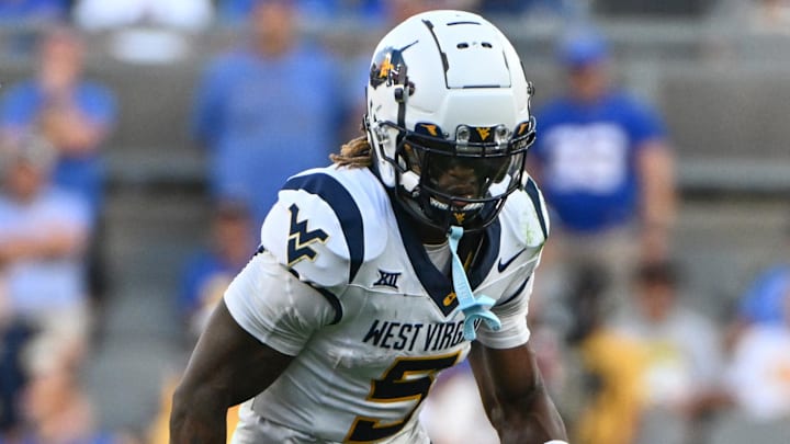 Sep 14, 2024; Pittsburgh, Pennsylvania, USA; West Virginia Mountaineers wide receiver Jaden Bray (5) runs against the Pittsburgh Panthers during the fourth quarter at Acrisure Stadium. Mandatory Credit: Barry Reeger-Image Images