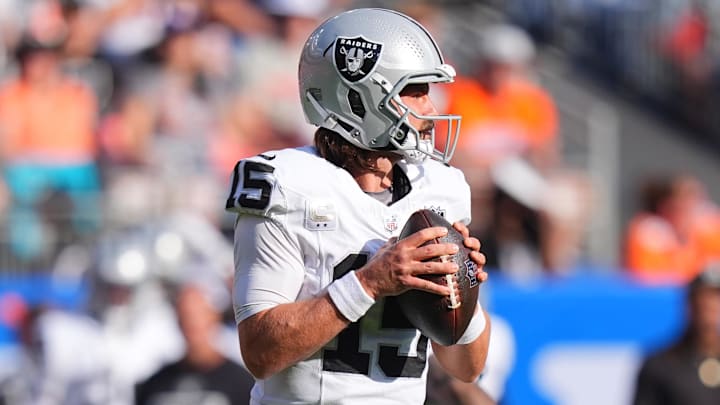 Oct 6, 2024; Denver, Colorado, USA; Las Vegas Raiders quarterback Gardner Minshew (15) prepares to pass in the second half against the Denver Broncos at Empower Field at Mile High. Mandatory Credit: Ron Chenoy-Imagn Images Oct 6, 2024; Denver, Colorado, USA; Las Vegas Raiders quarterback Gardner Minshew (15) prepares to pass in the second half against the Denver Broncos at Empower Field at Mile High. Mandatory Credit: Ron Chenoy-Imagn Images