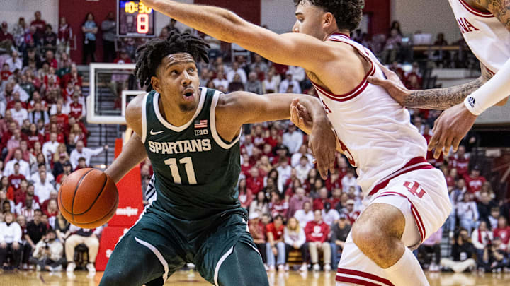 Mar 10, 2024; Bloomington, Indiana, USA; Michigan State Spartans guard A.J. Hoggard (11) dribbles