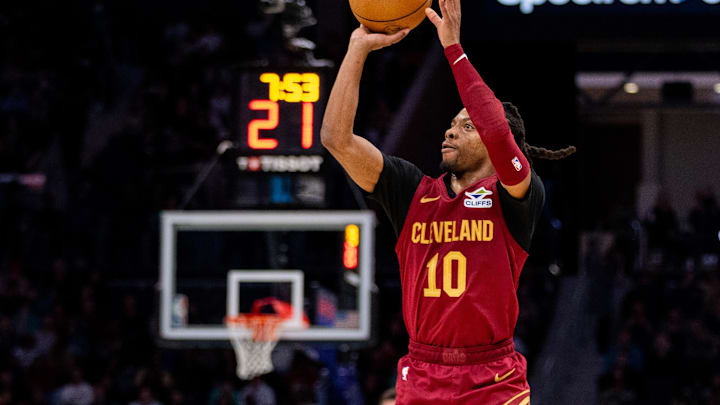 Mar 7, 2025; Charlotte, North Carolina, USA; Cleveland Cavaliers guard Darius Garland (10) shoots against the Charlotte Hornets during the third quarter at Spectrum Center. Mandatory Credit: Scott Kinser-Imagn Images
